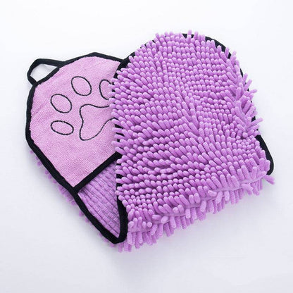 Super absorbent microfiber pet bath towel draped over a dog, quick-drying pet robe for bathing and drying pets.