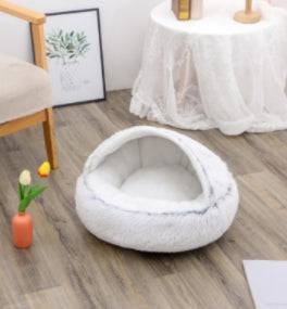 Cozy 2-in-1 plush pet bed for cats and dogs, featuring a self-warming house with soft, warm interior for comfort and relaxation.
