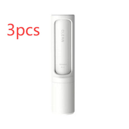 Reusable pet hair remover brush with self-cleaning lint roller for removing pet fur from clothing and furniture.