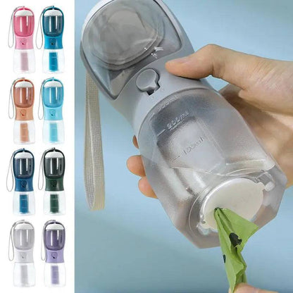 Portable 3-in-1 dog water cup and travel bottle for pets in blue, featuring a water dish and bottle cap for on-the-go hydration.