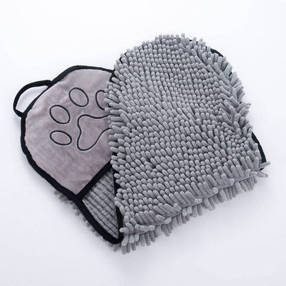 Super absorbent microfiber pet bath towel draped over a dog, quick-drying pet robe for bathing and drying pets.