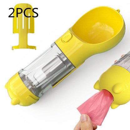 Portable pet water bottle with travel feeder and waste bag holder, ideal for dogs during outdoor walks and travel.