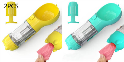 Portable 3-in-1 pet water bottle, travel feeder, and waste bag holder for dogs, compact and convenient for outdoor walks.
