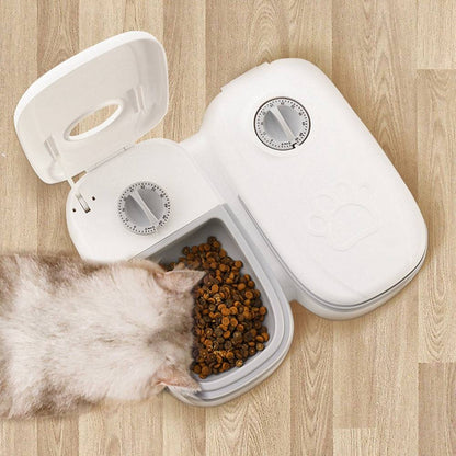 Automatic pet feeder for cats and dogs by My Store, featuring a smart dispenser with digital controls and food storage compartments.