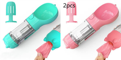 Portable My Store 3-in-1 pet water bottle, travel feeder, and waste bag holder with compartments for outdoor dog care.
