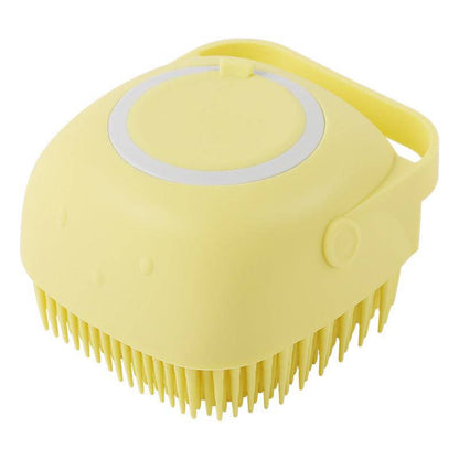 Silicone dog bath massage brush with shampoo dispenser, grooming tool for pets, blue ergonomic design, effective cleaning and massaging.