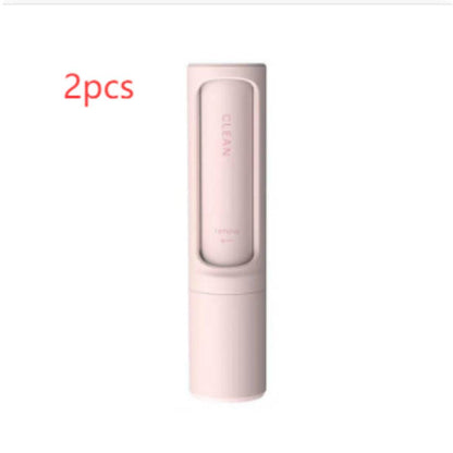 Reusable pet hair remover brush with self-cleaning lint roller, portable design for quick pet hair removal from clothing and furniture.