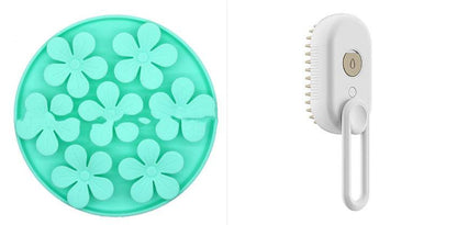 Electric steam pet grooming brush by My Store, showing a pet grooming device with bristles, steam vents, and ergonomic handle.