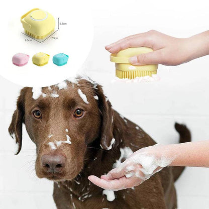 Silicone dog bath massage brush with shampoo dispenser, pet grooming tool in blue for gentle cleaning and massage.