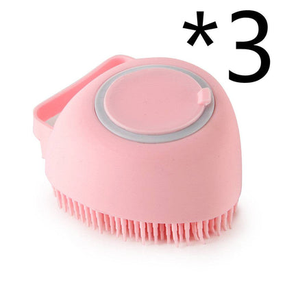 Silicone dog bath massage brush with shampoo dispensing feature, pet grooming tool for gentle cleaning and massaging dogs.