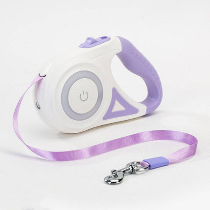 Retractable dog leash with built-in light for secure night walks, shown with a dog on a suburban sidewalk.