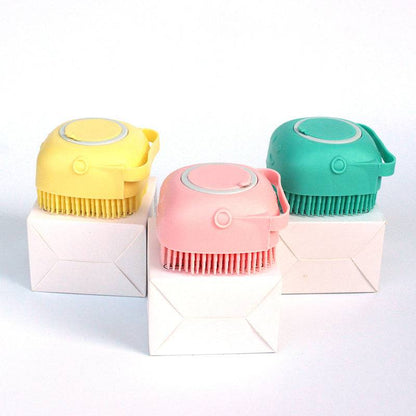 Silicone dog bath massage brush with shampoo dispensing feature, pet grooming tool for gentle cleaning and massage.